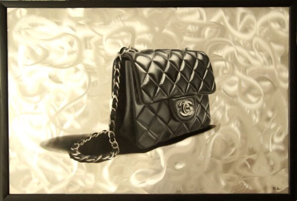 Canvas bag painting of a quilted luxury handbag on brushed aluminum, blending art and fashion in a striking composition.