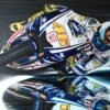 Dynamic MotoGP canvas wall art featuring a racer in action with vibrant colors and reflections, perfect for racing fans.