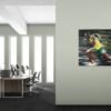 Sports wall art placed in an office space with minimalistic design and tall windows.