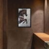 Horse painting on canvas showcasing a rearing horse, elegantly displayed in a warm-toned, minimalist space with accent lighting.