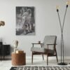 Black and white wall art featuring a vintage-inspired portrait of a woman, displayed in a modern, minimalist living room.