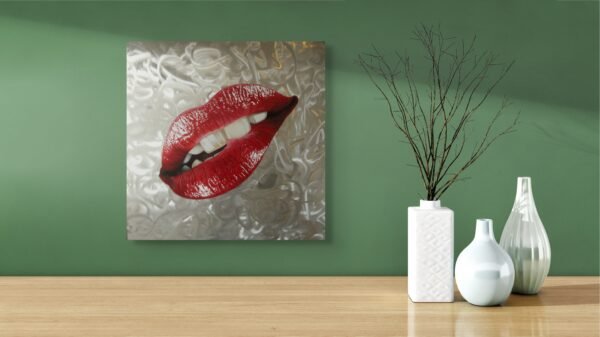 Red lips pop art painting on a textured silver background, displayed on a green wall with minimalist vases for decor.