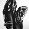 professional paintings: A black-and-white figurative painting depicting an intimate embrace, showcased above a sleek modern console with minimalist decor.
