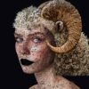 Surreal female portrait with horns, digital artwork from The Other Me collection exploring hybrid dreams and wild identity. Artist: Sarv
